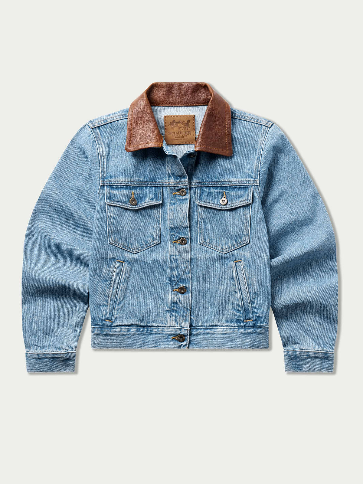 Light wash denim jacket with brown collar and chest button pockets