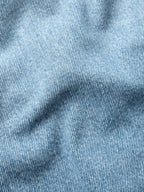 Light wash denim fabric texture close-up