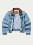 Light wash denim jacket with brown collar, button placket, and snap pockets
