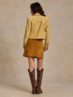 Buttercream suede jacket back with decorative whipstitch pattern across yoke