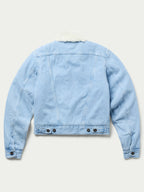 Light wash denim jacket with sherpa lining on collar and hem, buttoned cuffs