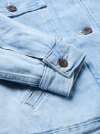 Light wash denim jacket with flap chest pocket and metal snap buttons