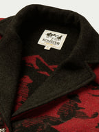 Dark gray interior collar label with SCHAEFFER OUTERWEAR on blanket-style coat