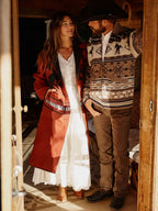 Women's blanket coat, crimson with woven border detail and open front drape