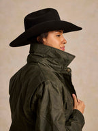Loden dark green barn coat collar and shoulder detail with buttoned flap