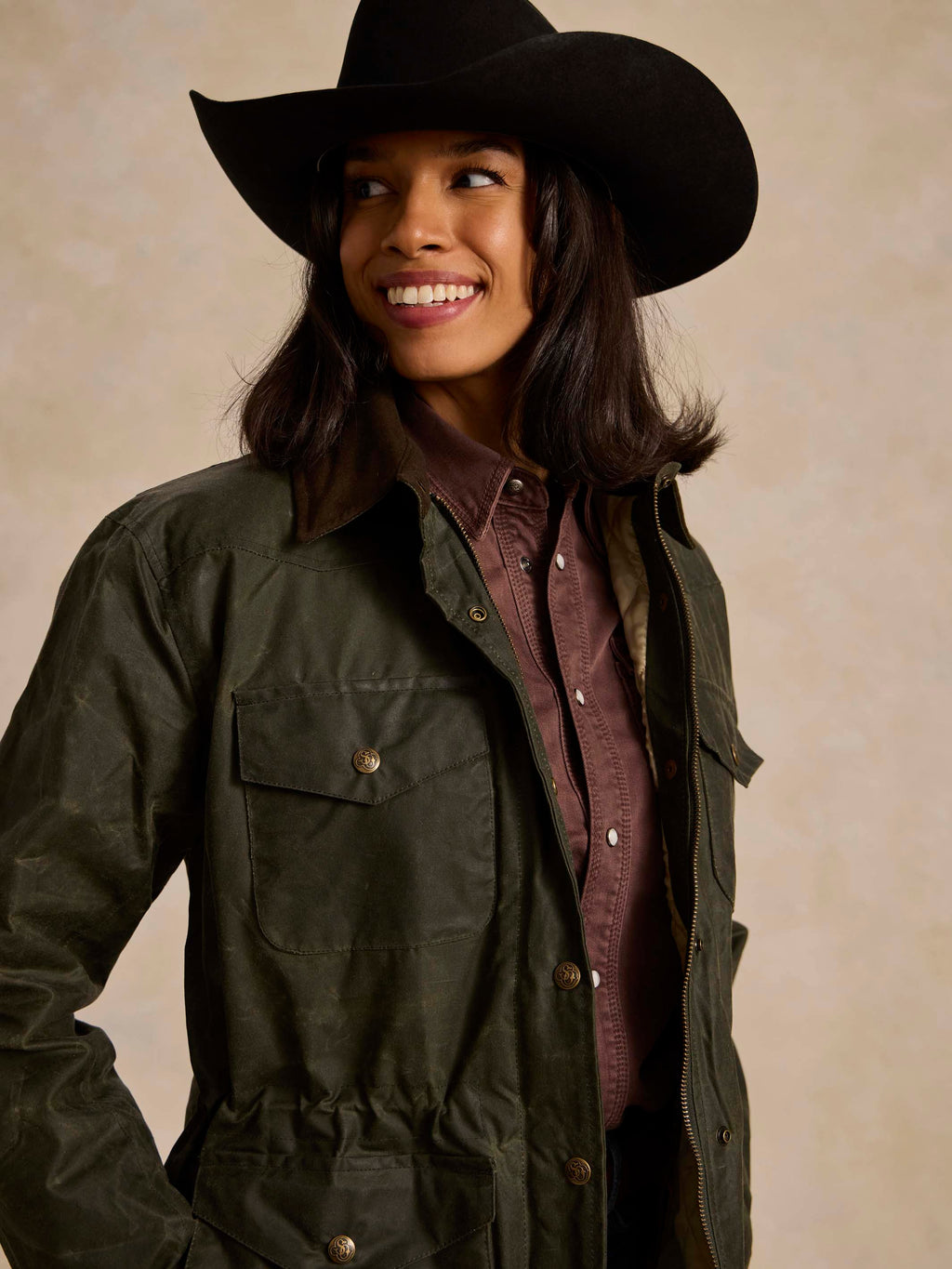 Loden dark green barn coat with button front, patch pockets, and cord collar detail