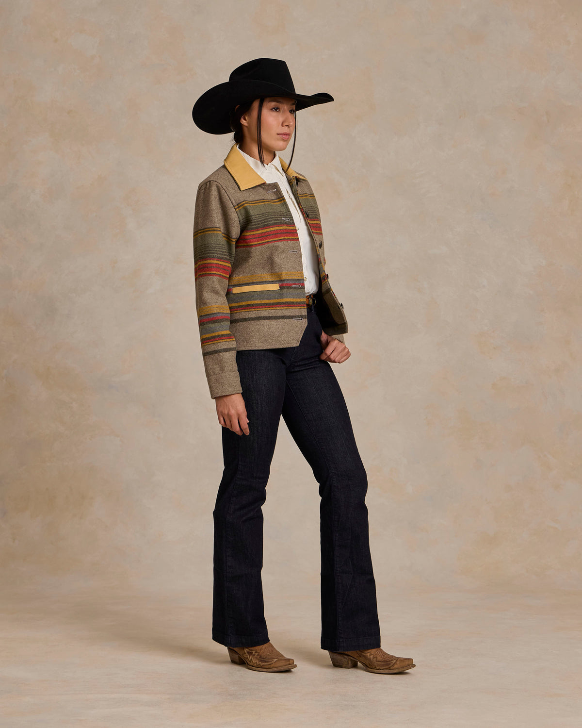 Women’s taupe striped jacket with tan leather-style collar, side view