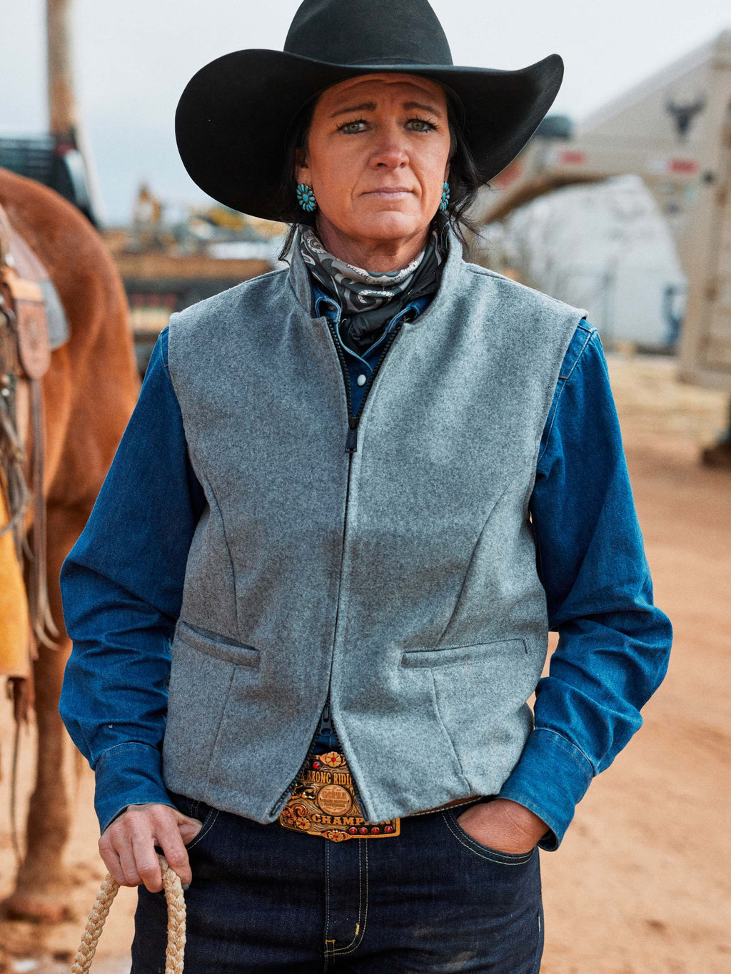 Heather gray wool vest with zip front, stand collar, and front flap pockets