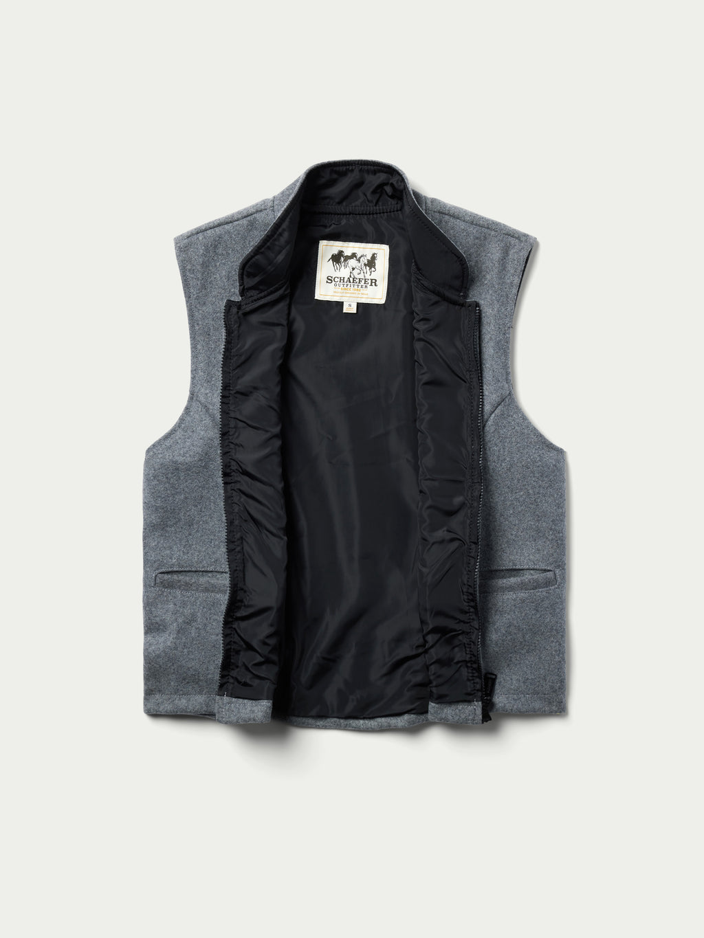 Heather gray wool vest with black lining and zip front