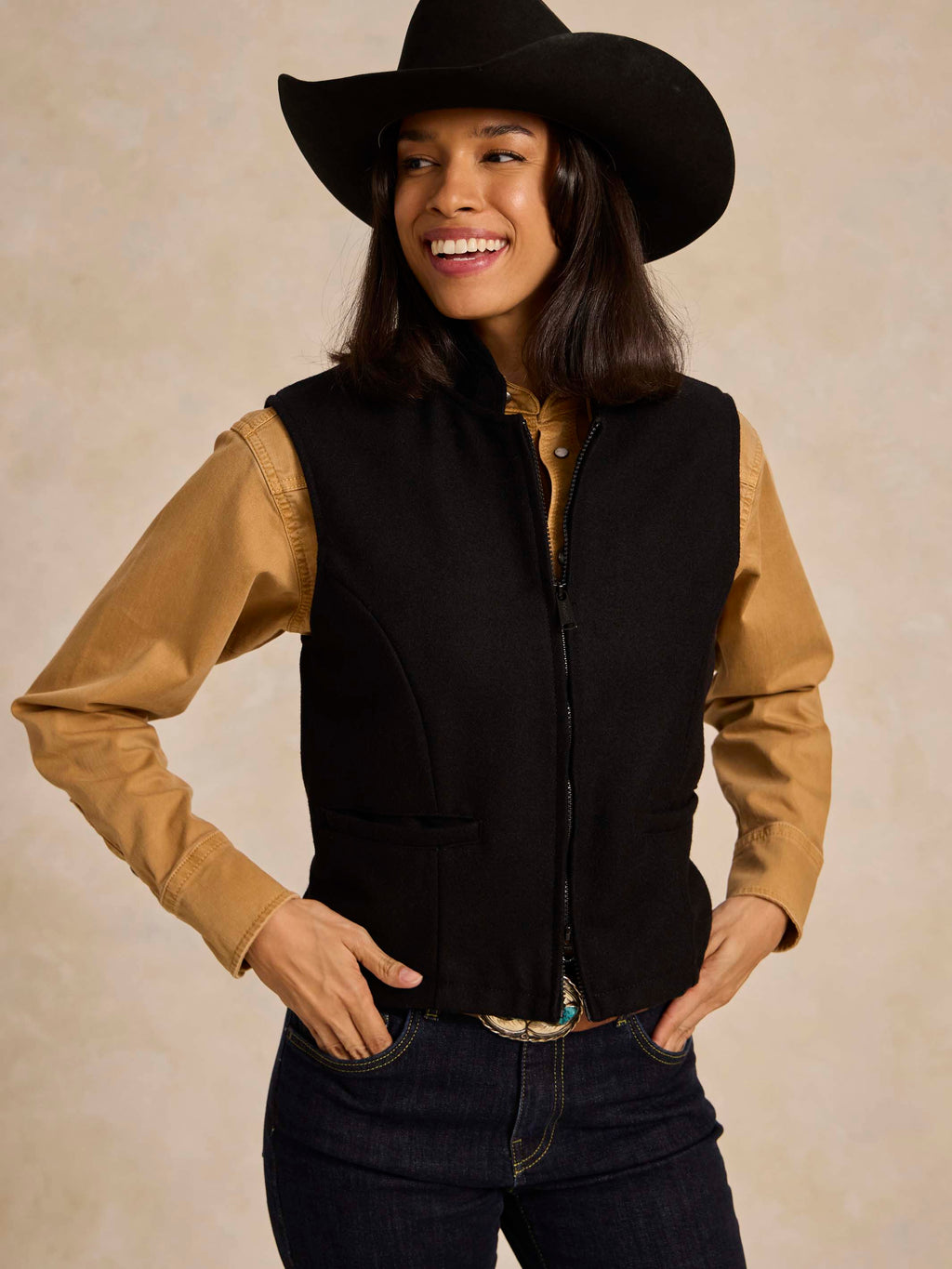 Black wool vest with full-zip front and welt pockets