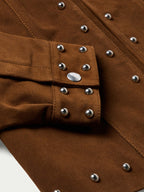 Pecan suede jacket cuff detail with silver studs and snap-button closure