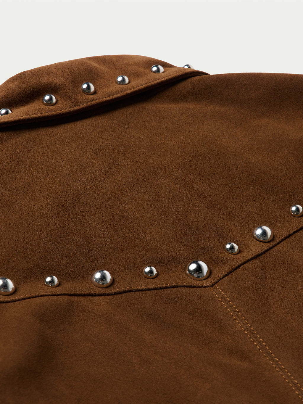 Pecan suede jacket close-up of shoulder yoke with silver stud trim