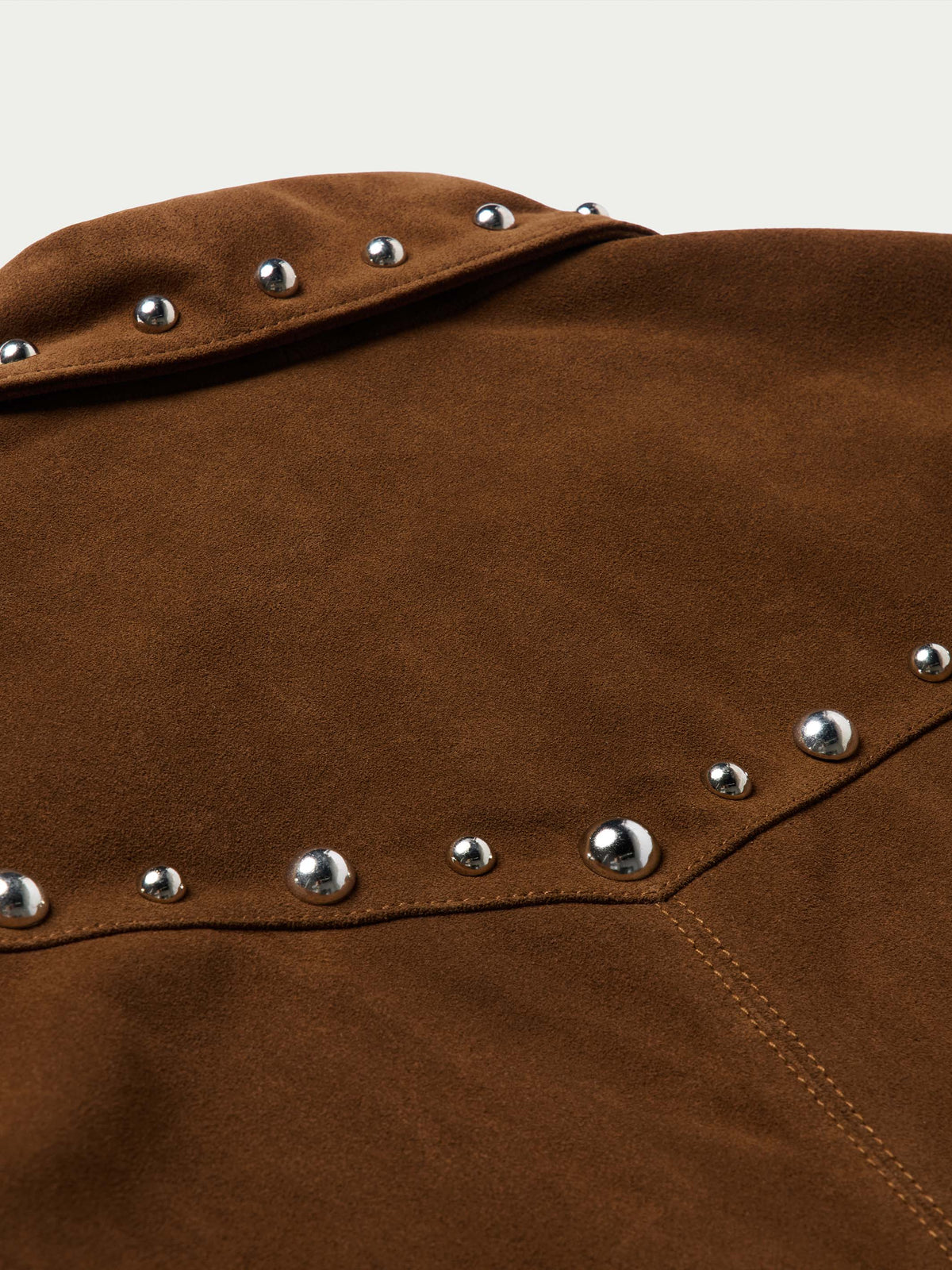 Pecan suede jacket close-up of shoulder yoke with silver stud trim