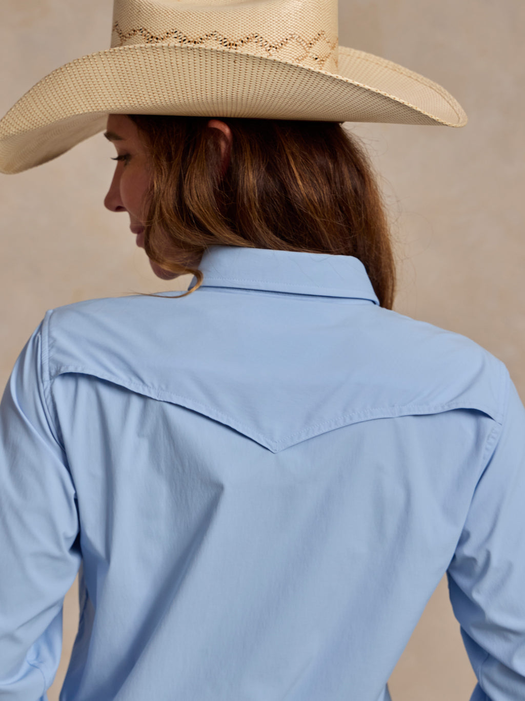 Women’s sky blue Western snap shirt back detail with yoke and collar