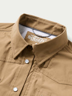 Tan western snap shirt front collar with snap placket and brand tag inside
