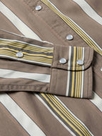 Women’s striped snap shirt sleeve and front placket with silver snap buttons