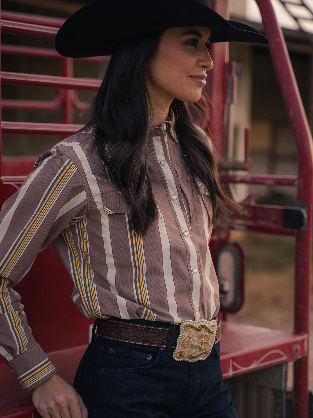 Women’s western snap shirt in striped tan, cream, and yellow with button flap pockets