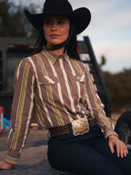 Women’s striped western snap shirt with pointed collar, front snap buttons, chest pockets