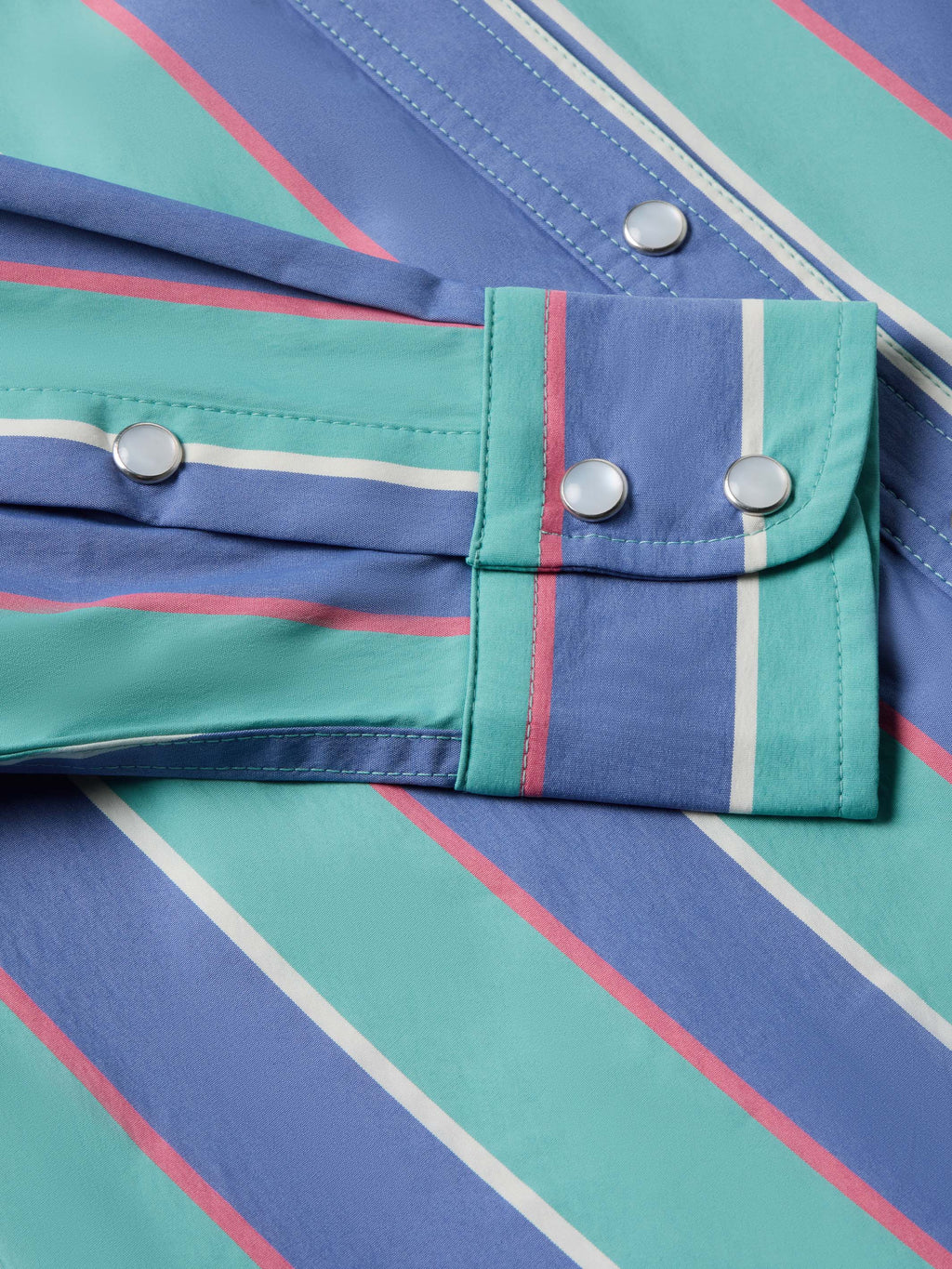 Striped snap shirt pocket detail with round snaps, teal and blue with pink lines