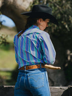 Women’s striped western snap shirt with snap yoke, seen from behind on model