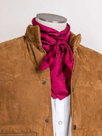 Burgundy jacquard wild rag scarf tied in a bow at the neck