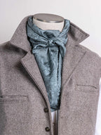 Sage green jacquard wild rag scarf with bow tie at neckline