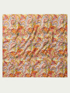 Paisley wild rag scarf with colorful red, orange, blue, and yellow swirl pattern
