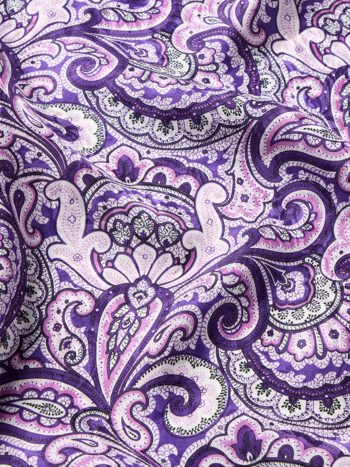 Purple paisley wild rag scarf close-up with detailed floral swirl motifs