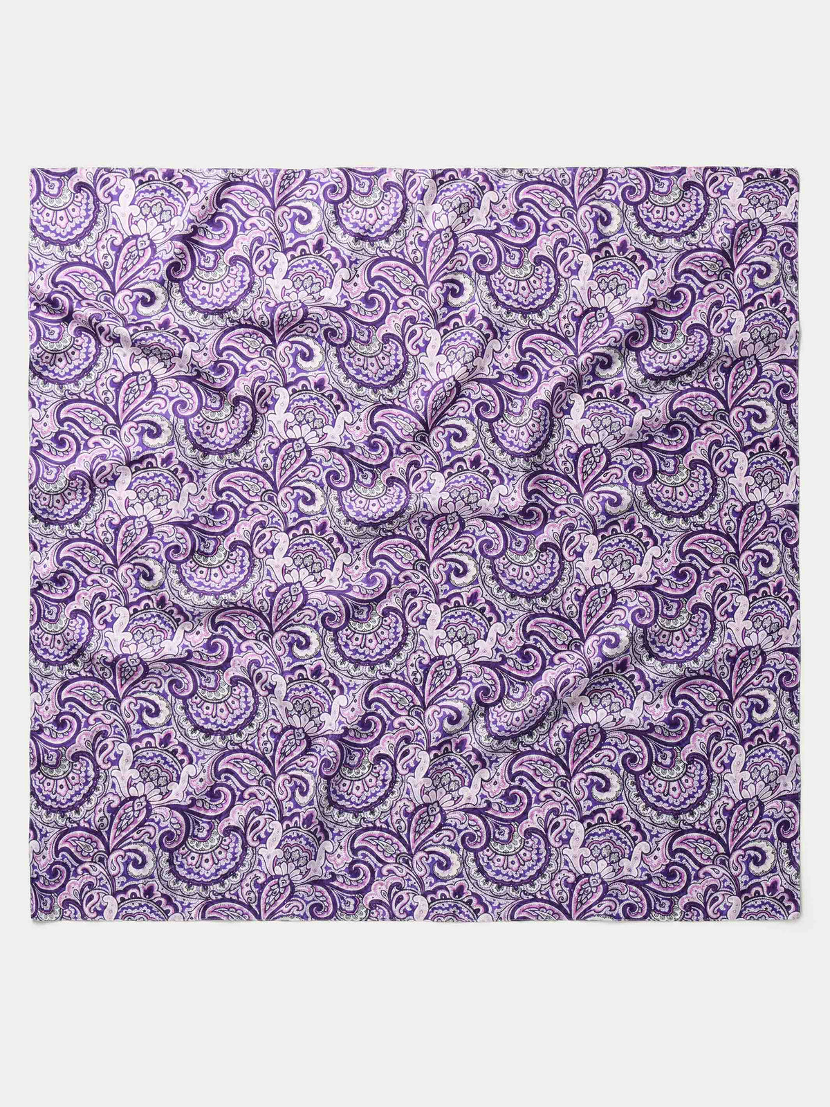 Purple paisley wild rag scarf with ornate swirl pattern, flat lay