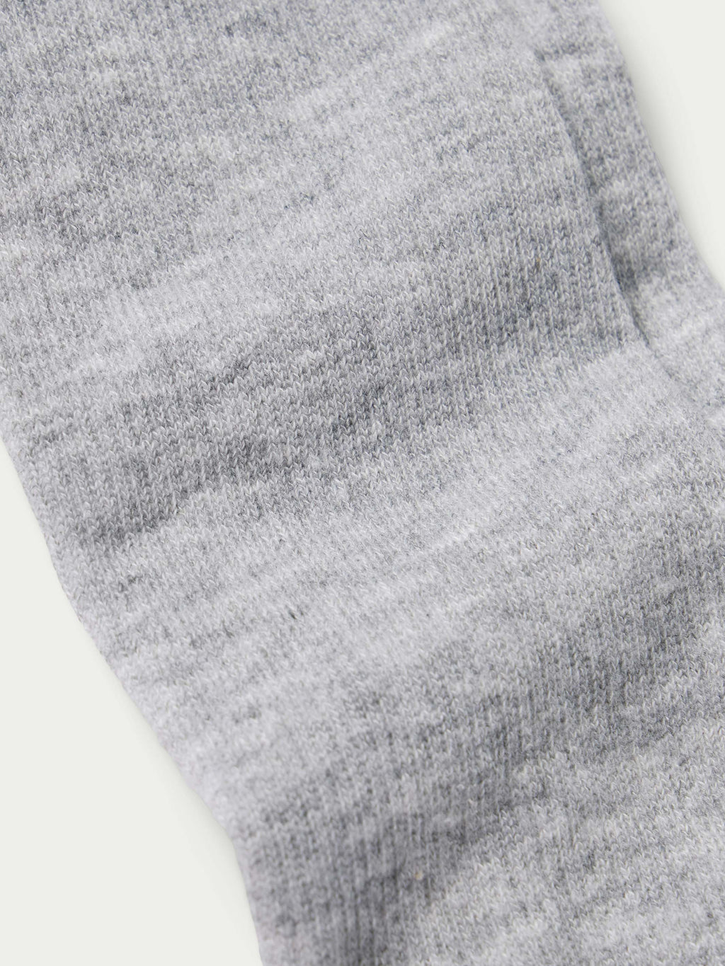 Gray heather boot sock with ribbed knit cuff and textured fabric