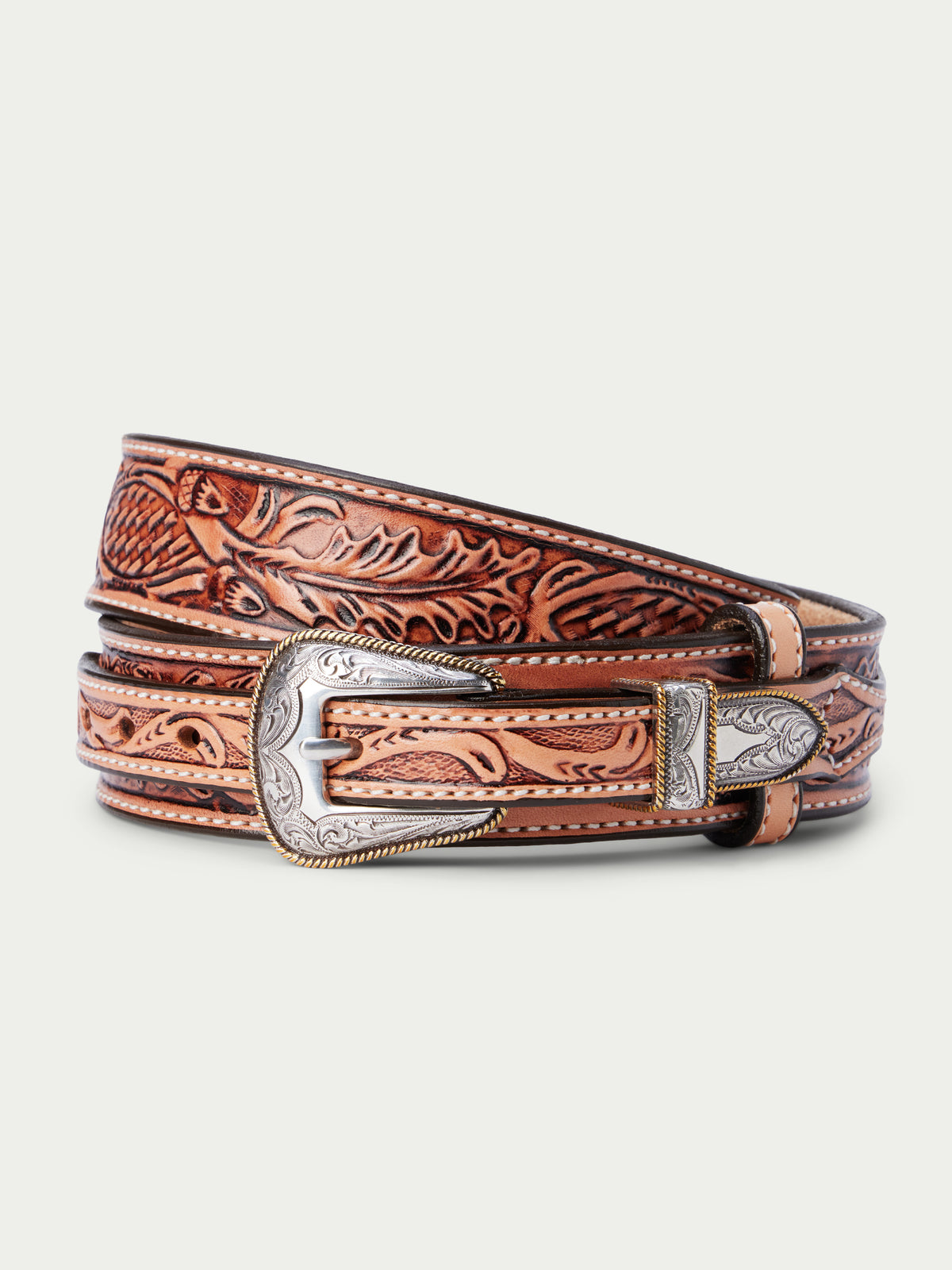 Western ranger belt with embossed tan leather and engraved silver buckle, embossed pattern