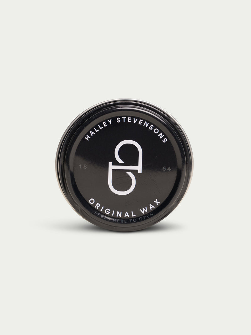 Halley Stevensons reproofing wax tin, original wax, round black lid