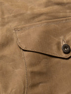 RangeWax® Mesquite brush jacket flap pocket with snap button on sand canvas