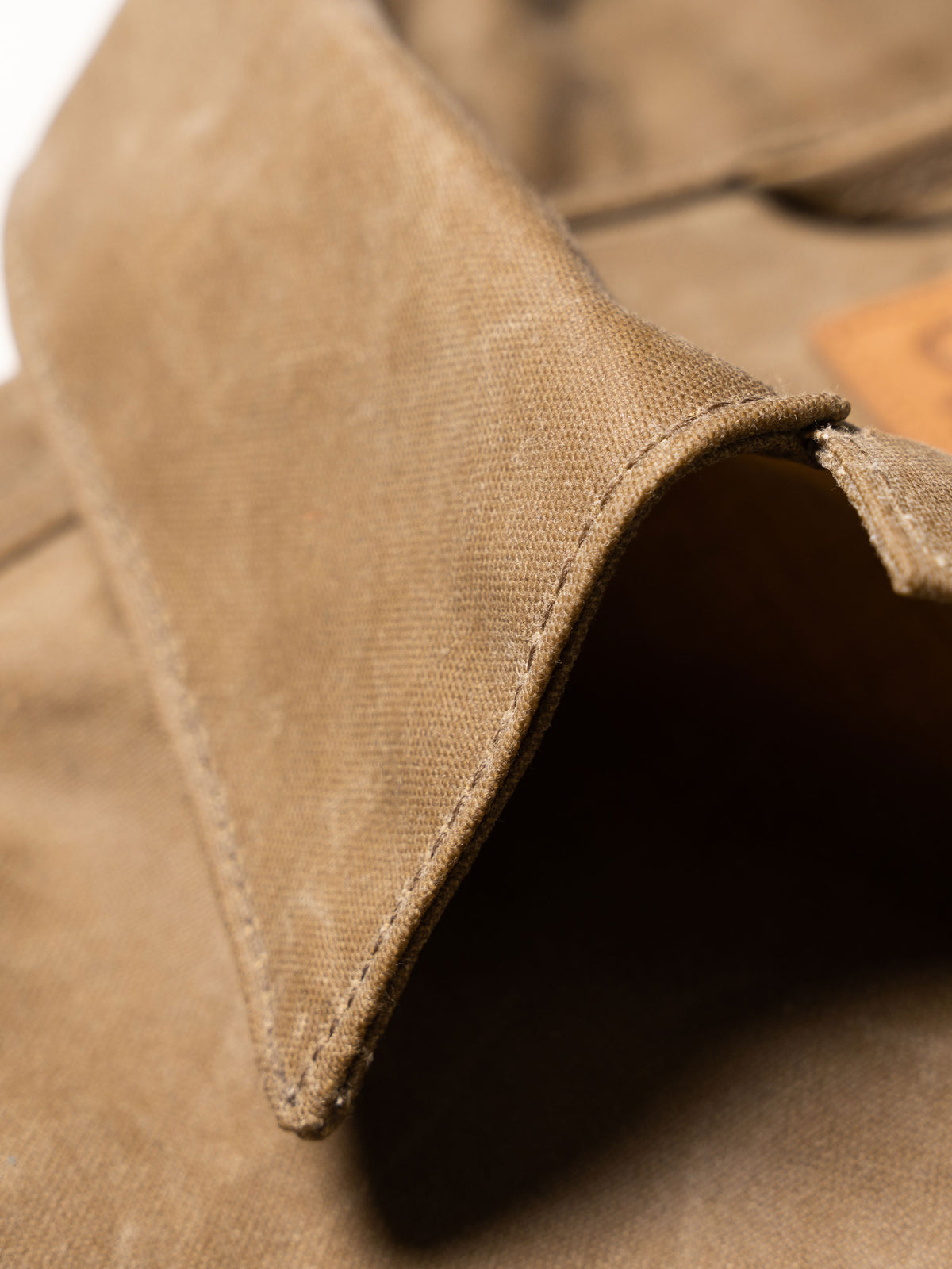 RangeWax® Mesquite brush jacket inside cuff seam on sand fabric