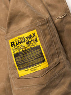 RangeWax® Mesquite brush jacket with RangeWax yellow care label on sand pocket