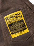 Mesquite vest yellow brand label on front pocket area